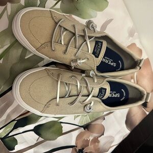 Sold Womens Sperry Tan Canvas Sneakers
New- without tag